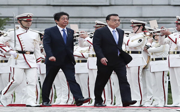 China to give Japan investment quota for first time to boost ties-中国首次给予日本人民币合格境外机构投资者额度，以增进关系