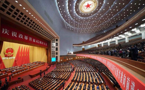 China vows to open up wider to world-